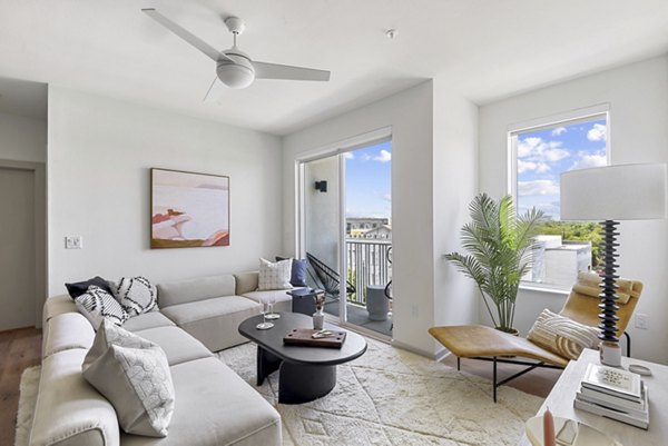 Modern living room with sleek furniture at Starlight Apartments