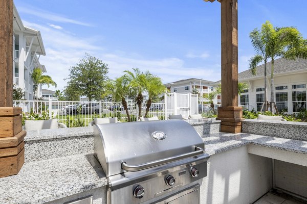 grill area at Lantana at Cypress Cay Apartments