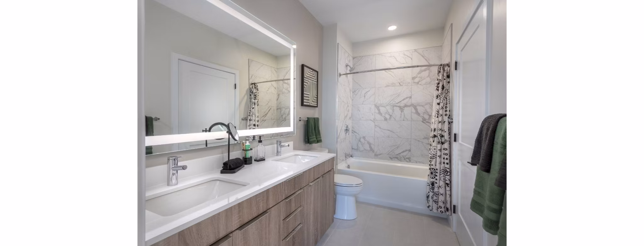 Sleek bathroom with modern fixtures at Matson Mill Apartments, offering luxury living by Greystar in a prime location