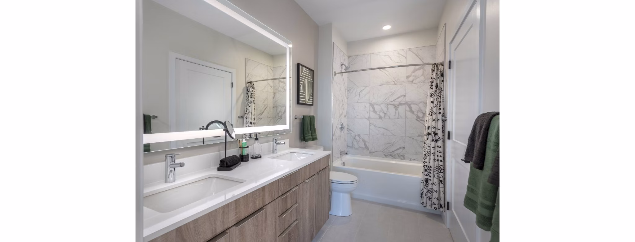 Sleek bathroom with modern fixtures at Matson Mill Apartments, offering luxury living by Greystar in a prime location