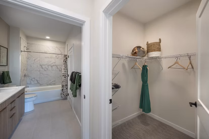 Modern hallway with sleek lighting fixtures at Matson Mill Apartments, showcasing luxury finishes and contemporary design