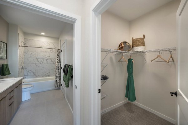 Modern hallway with sleek lighting fixtures at Matson Mill Apartments, showcasing luxury finishes and contemporary design