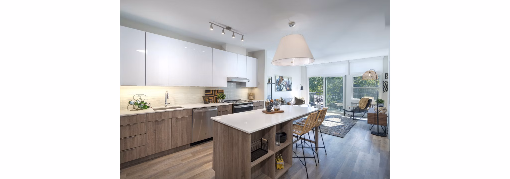 Modern kitchen with stainless steel appliances in Matson Mill Apartments