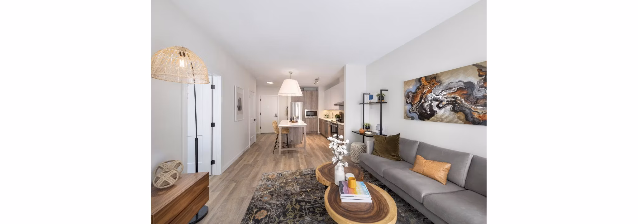 Modern living room with sleek furnishings at Matson Mill Apartments, offering luxury lifestyle in a premier location