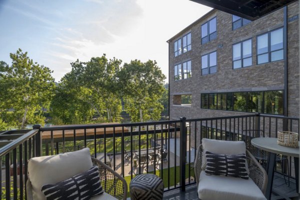 Elegant patio with stylish seating at Matson Mill Apartments