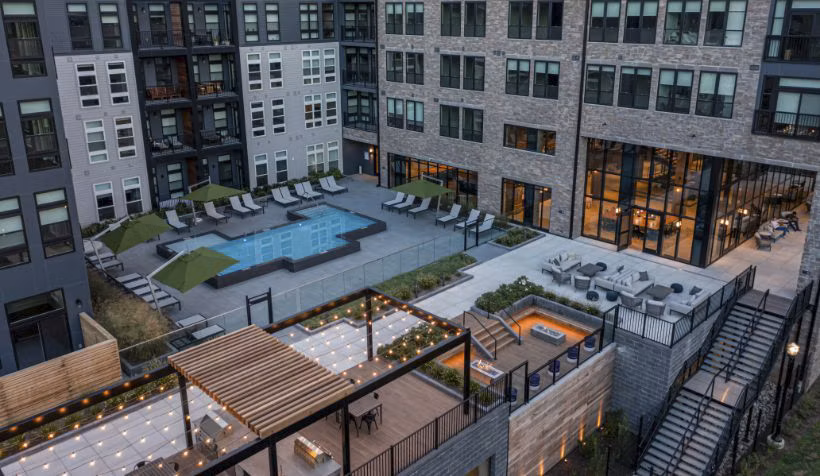 Riverside view at luxury high-rise Matson Mill Apartments in scenic setting