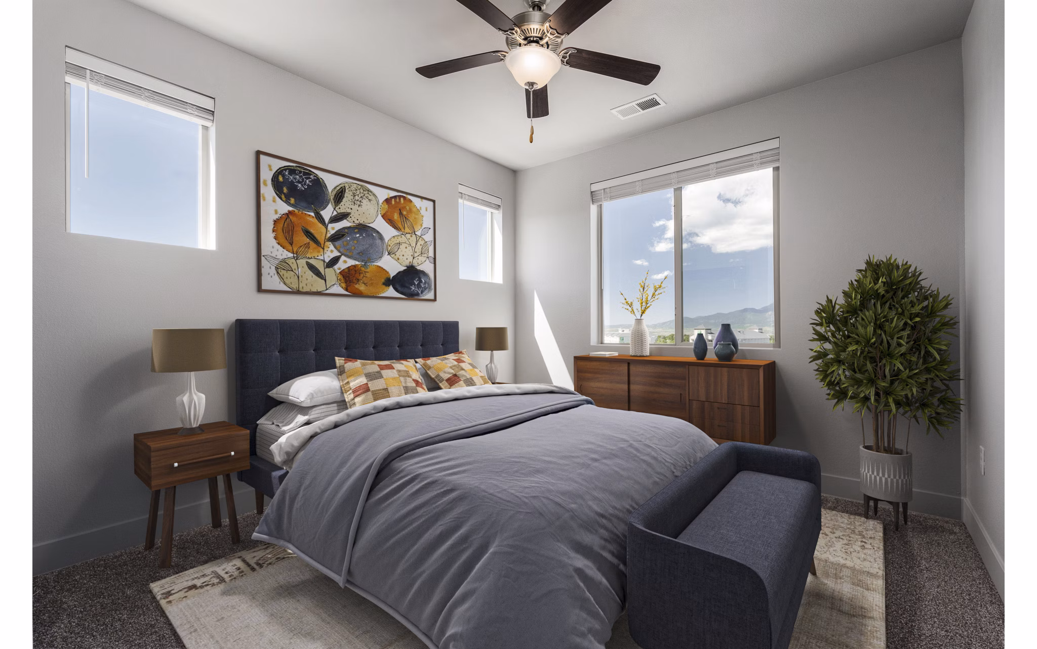 Spacious bedroom with modern furnishings at The Flats at Aero Park Apartments