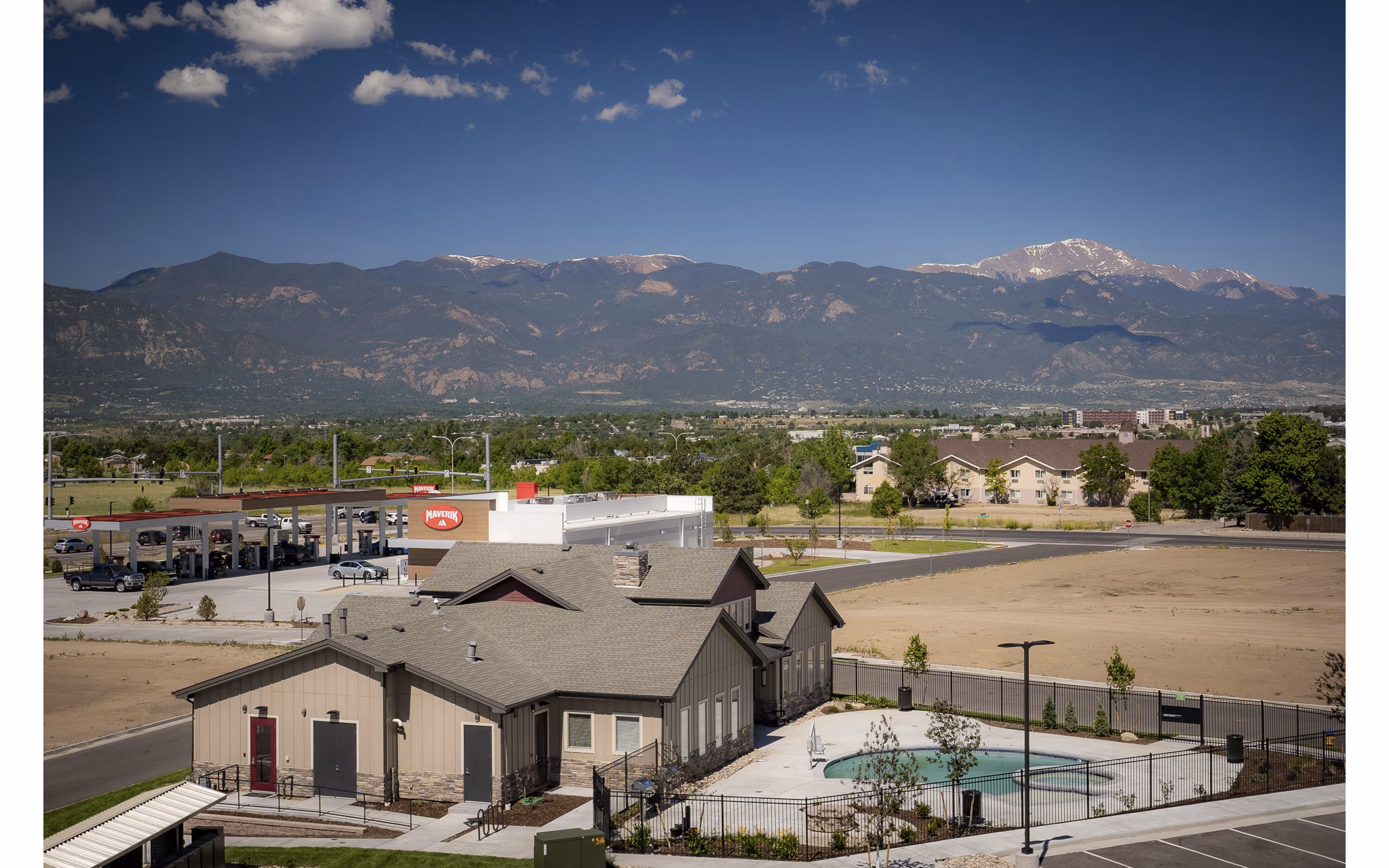 The Flats at Aero Park: Scenic view of luxury apartments with modern design and lush landscaping in San Diego