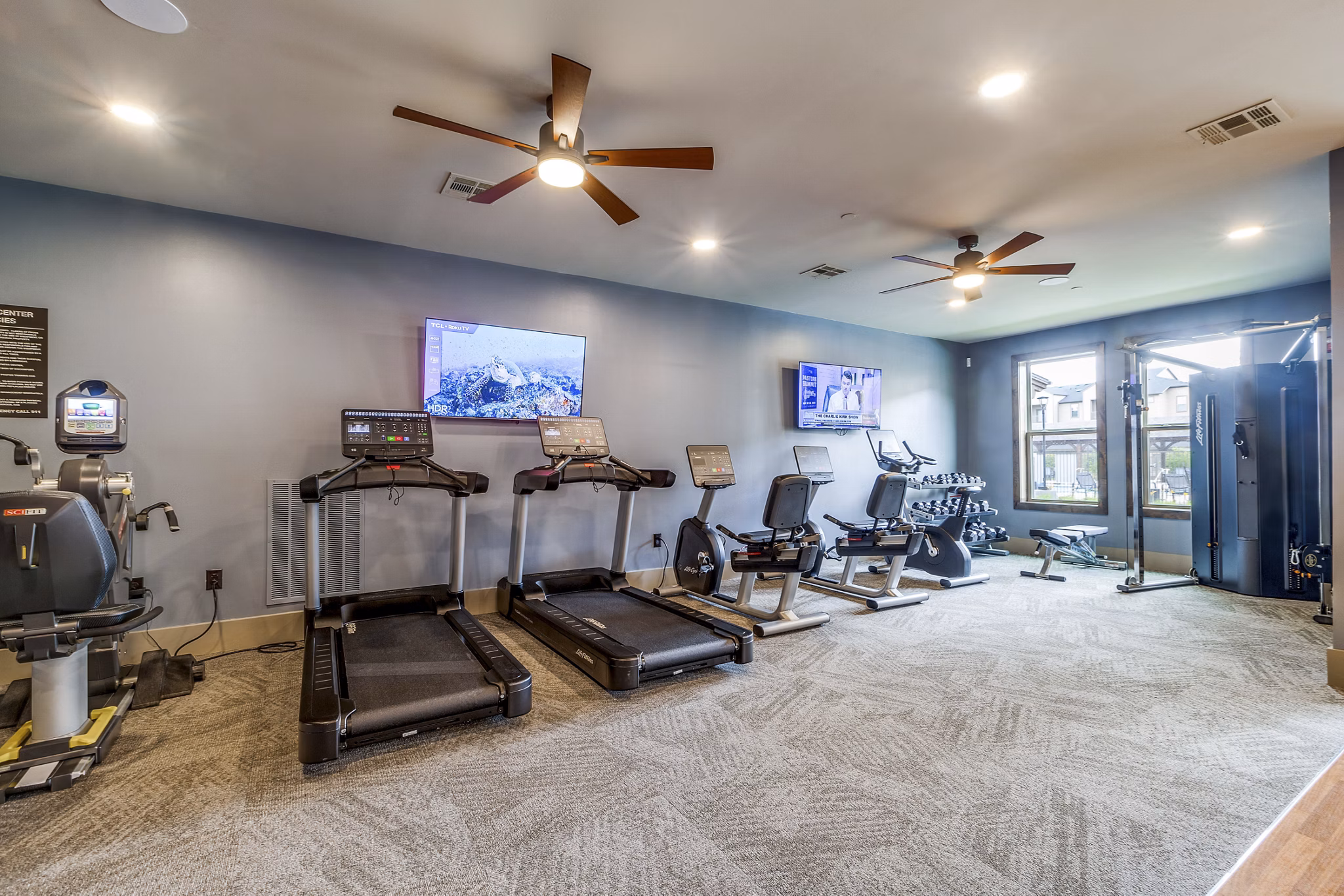 Alders Cross Creek Apartments: Modern fitness center featuring state-of-the-art equipment and spacious workout areas