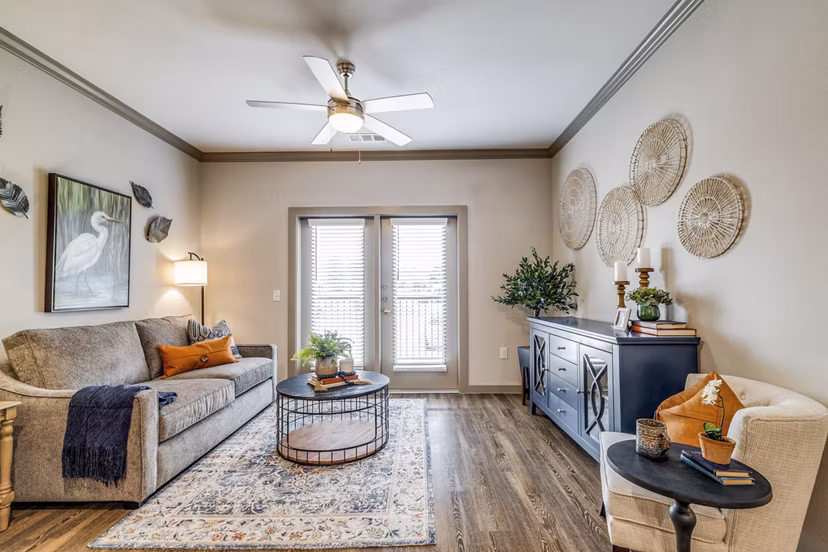 Contemporary living room with plush seating and modern decor at Alders Cross Creek Apartments