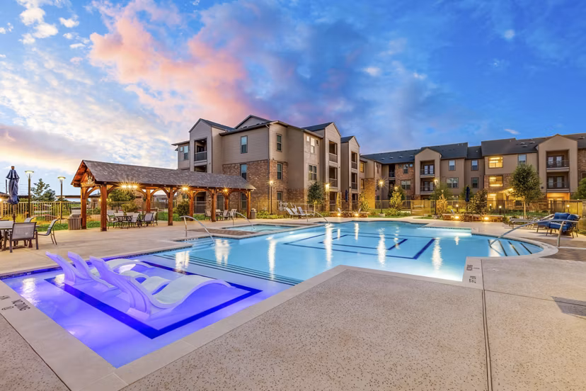 Peaceful poolside oasis at Alders Cross Creek Apartments