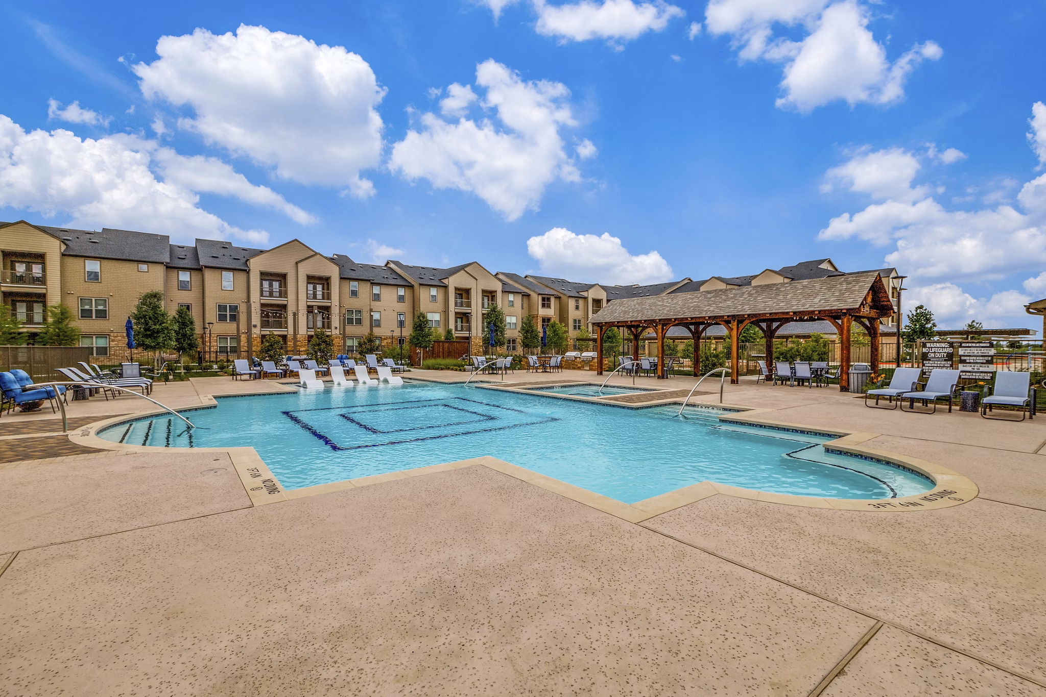 Sleek swimming pool area at Alders Cross Creek Apartments
