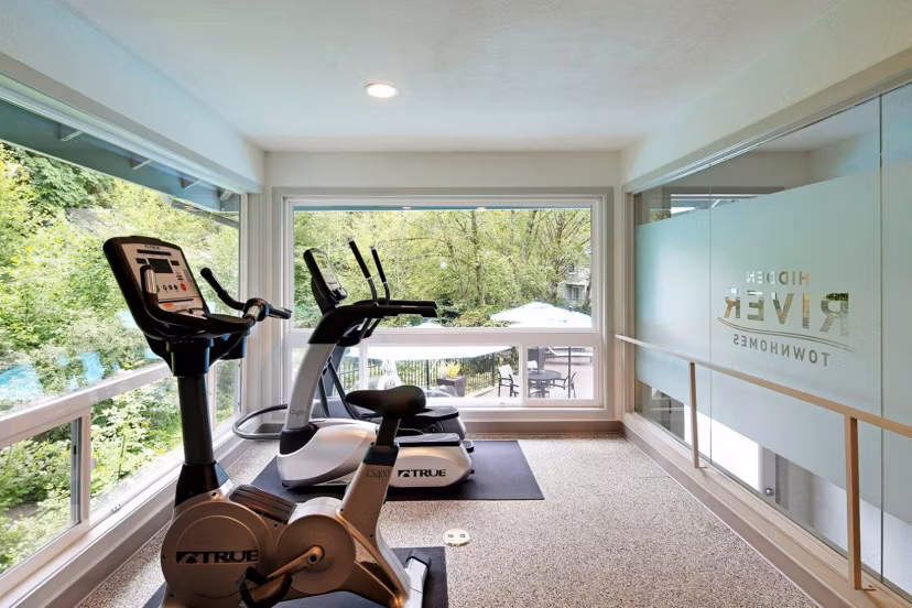 fitness center at Hidden River Townhomes Apartments 