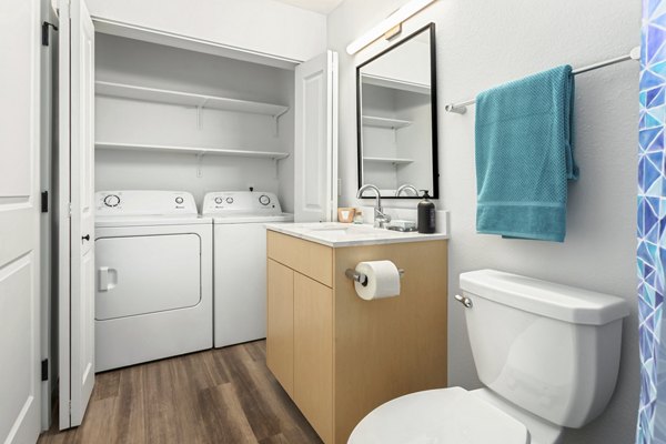 bathroom and laundry room at Scout Apartments