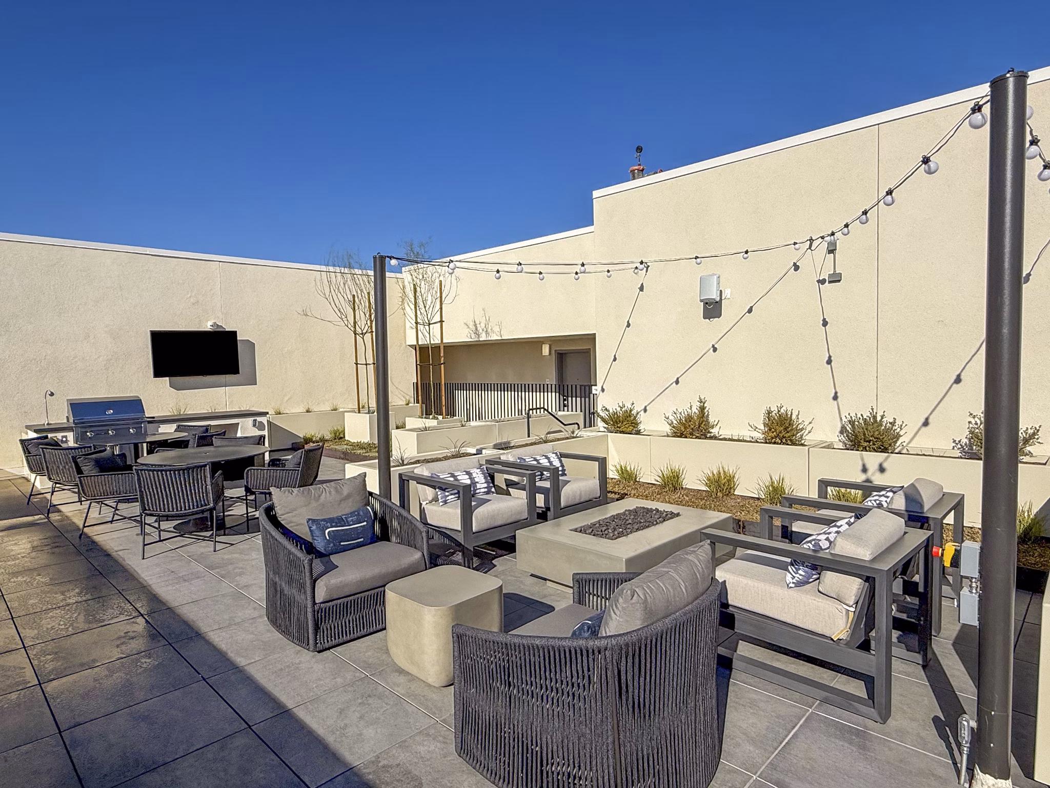 grill area at The DeMilo Apartments