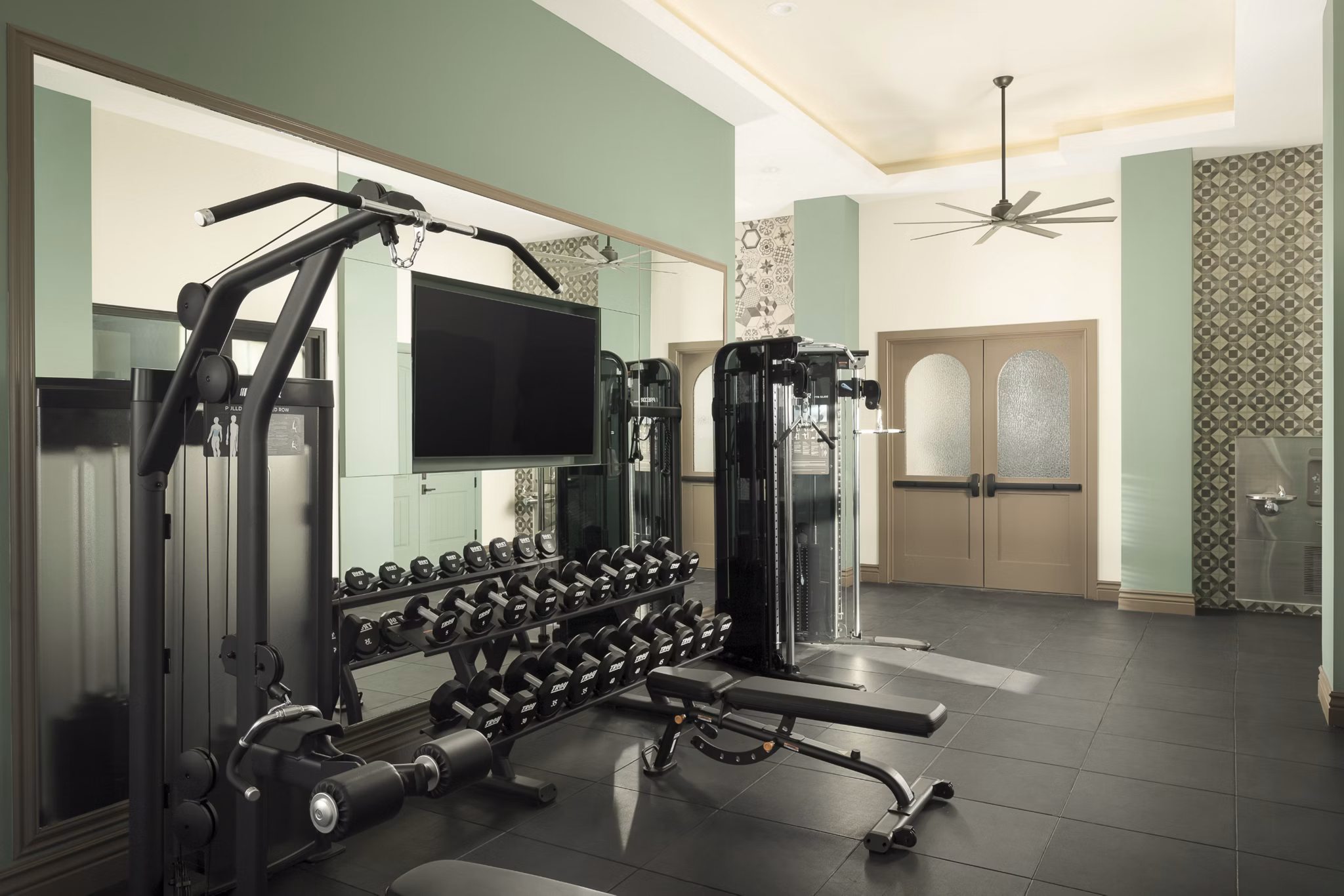 fitness center at The Beverly Apartments