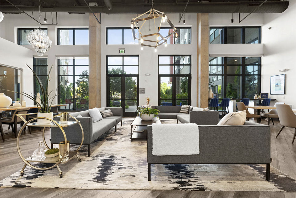 Elegant clubhouse with modern furnishings at Bradham at New Bern Apartments
