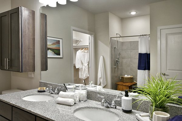 Modern bathroom with sleek fixtures at The Aspens Verdae Apartments, luxury living with refined elements in prime location