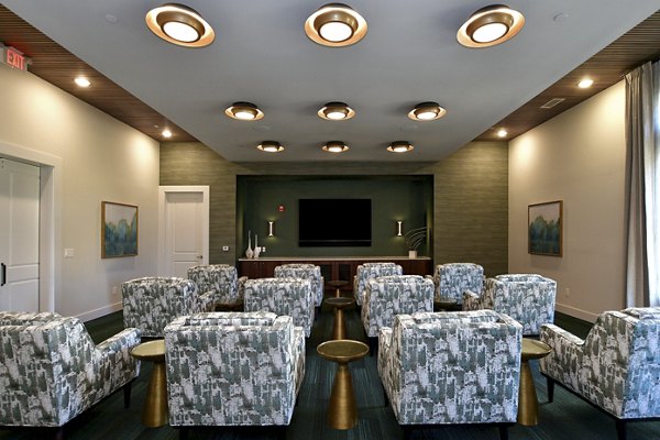 Theater room with plush seating at The Aspens Verdae Apartments
