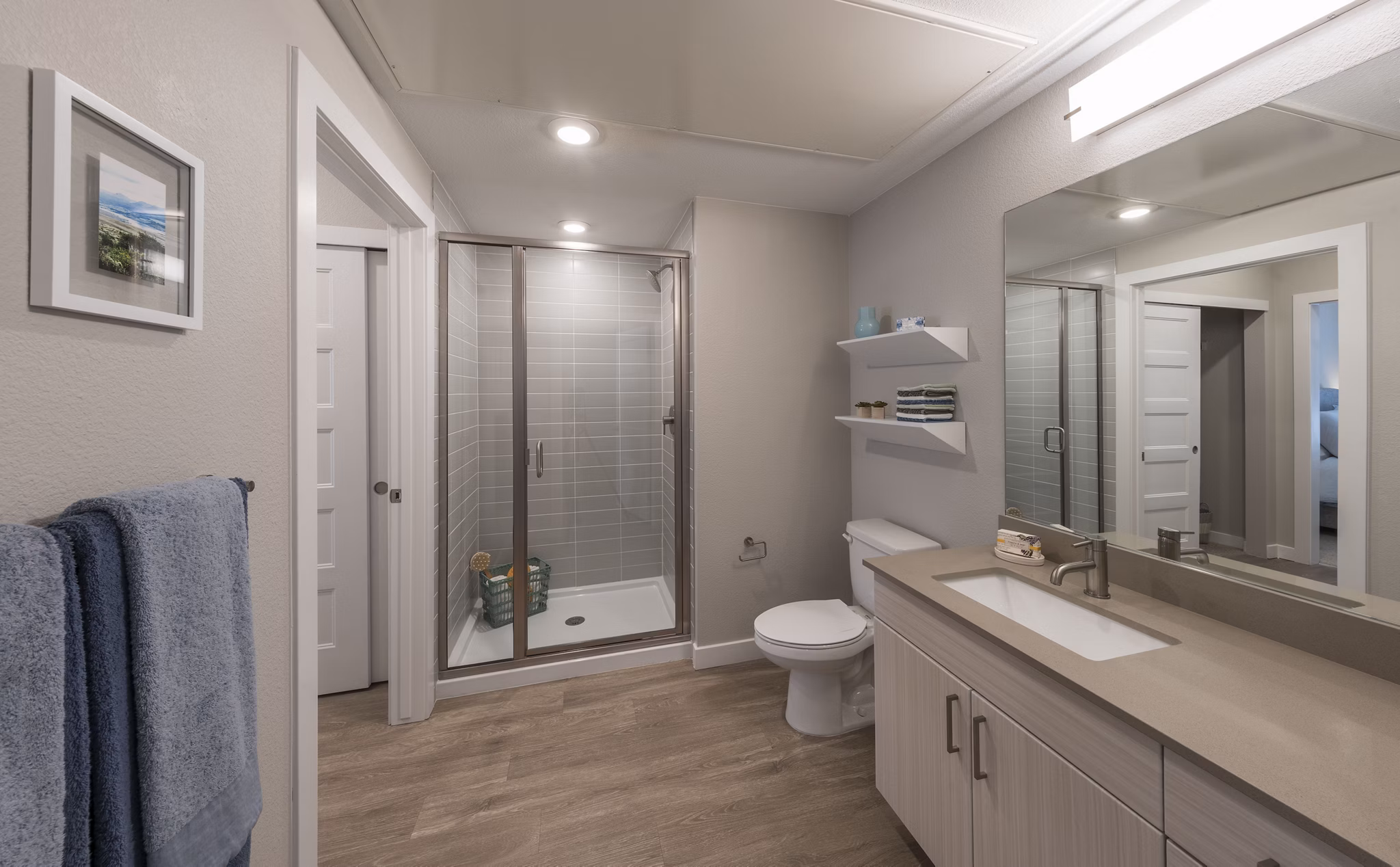 Beacon 85 Apartments: Modern bathroom featuring sleek fixtures and spacious design