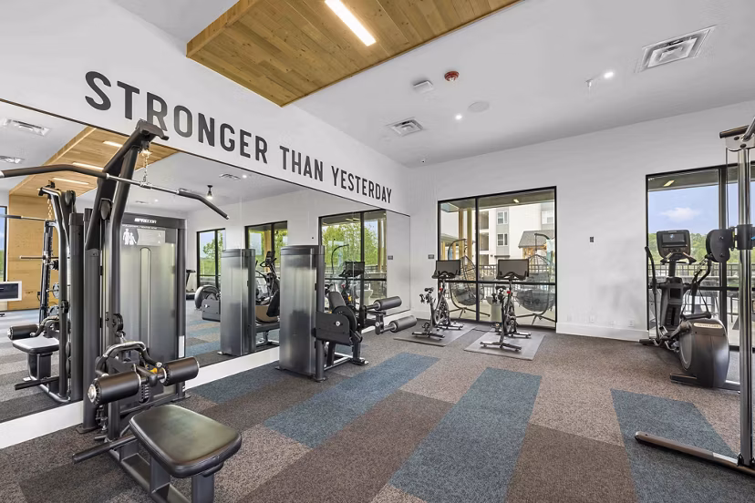 fitness center at Hominy at RiverBlue Apartments