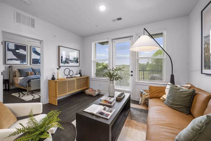 living room at Hominy at RiverBlue Apartments