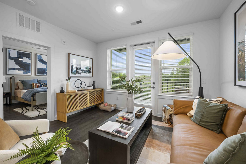 living room at Hominy at RiverBlue Apartments