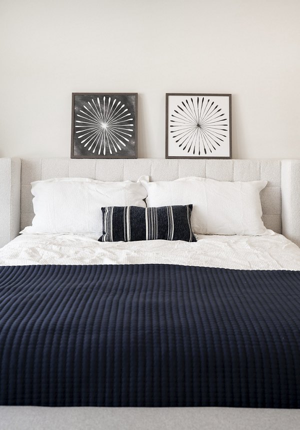 Bedroom featuring modern decor and large windows in Klein Huis at Turner Mill Apartments