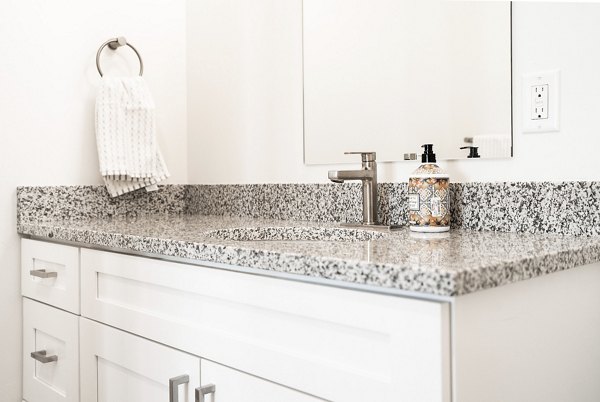 Stylish bathroom with modern fixtures at Klein Huis in Turner Mill Apartments