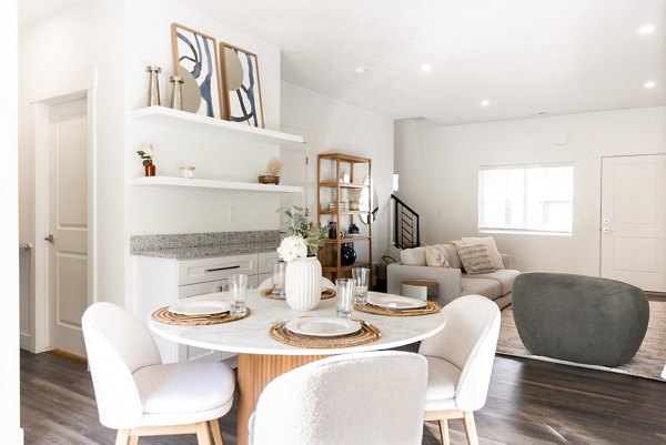 Dining area with elegant lighting and modern finishes in Klein Huis at Turner Mill Apartments