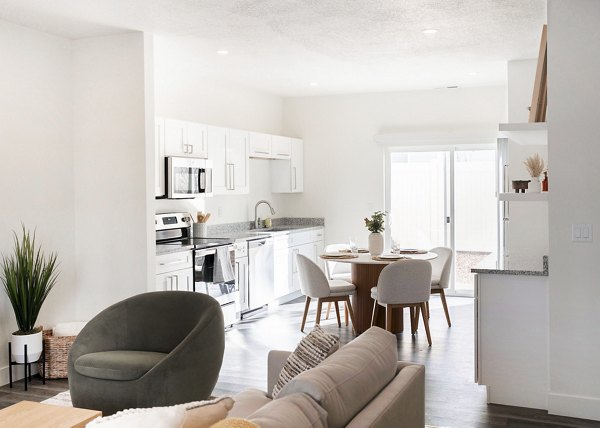 Living room with modern furnishings and light-filled space at Klein Huis in Turner Mill Apartments