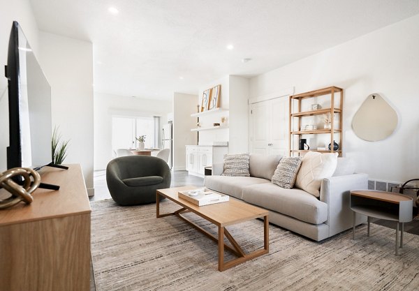Spacious living room featuring contemporary design elements in Klein Huis at Turner Mill Apartments