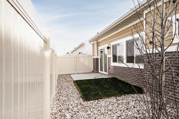 Charming patio with stylish furniture at Klein Huis in Turner Mill Apartments
