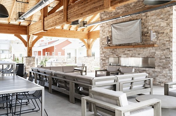 Spacious outdoor patio with modern seating at Milano Apartments