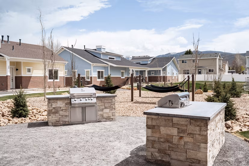 Outdoor grilling station with modern appliances at Milano Apartments