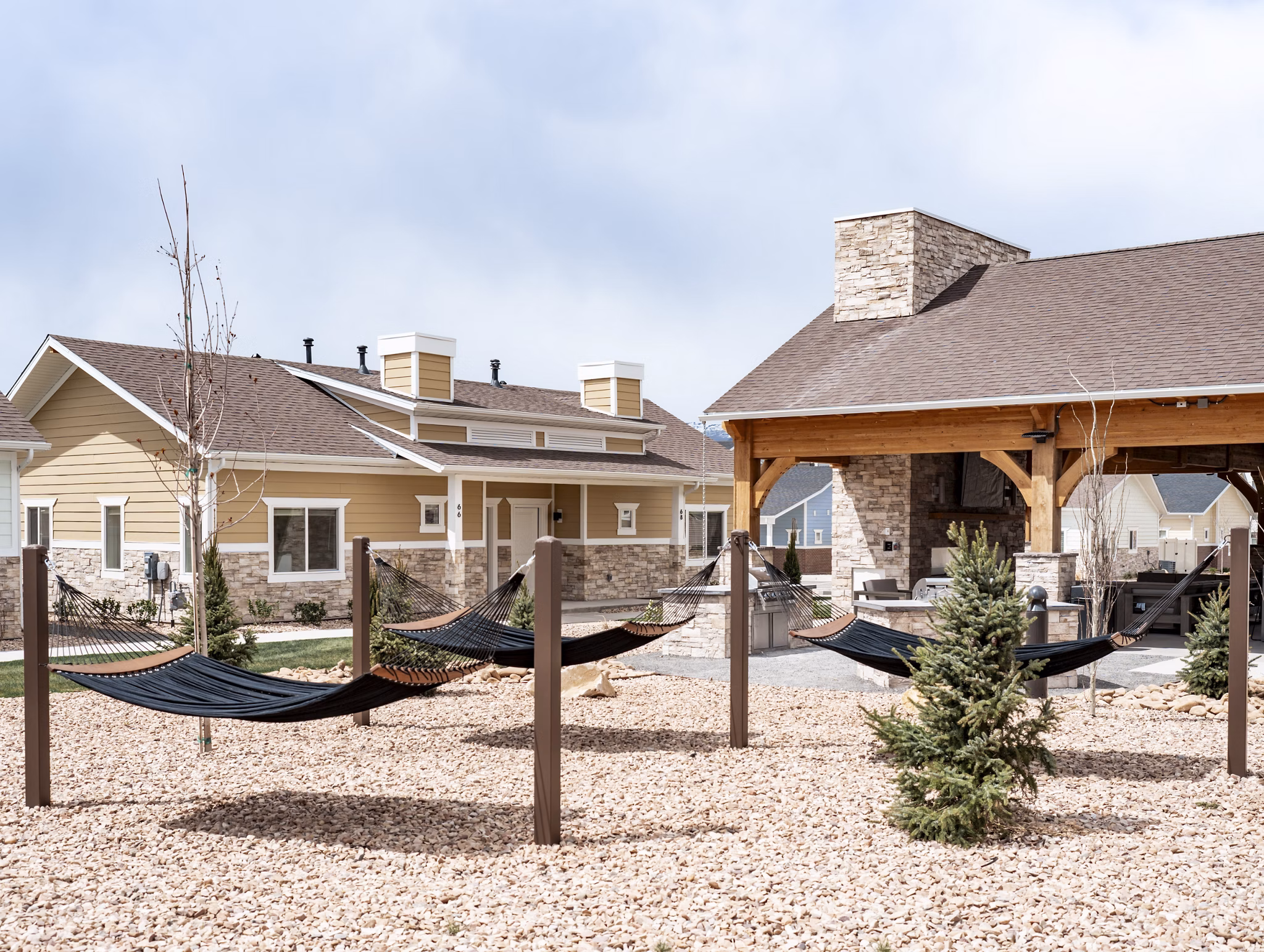 Tranquil courtyard with lush greenery at Milano Apartments, offering a serene retreat in a Greystar luxury community