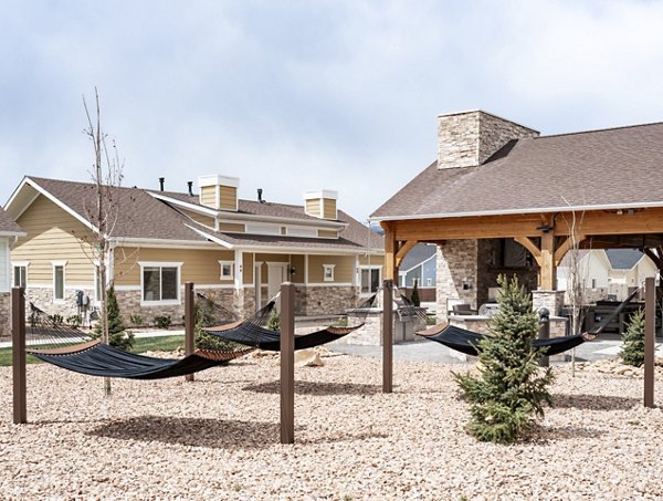 Tranquil courtyard with lush greenery at Milano Apartments, offering a serene retreat in a Greystar luxury community
