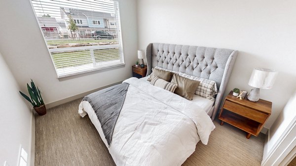 Spacious bedroom featuring modern decor at Sequoia Apartments, Turner Mill