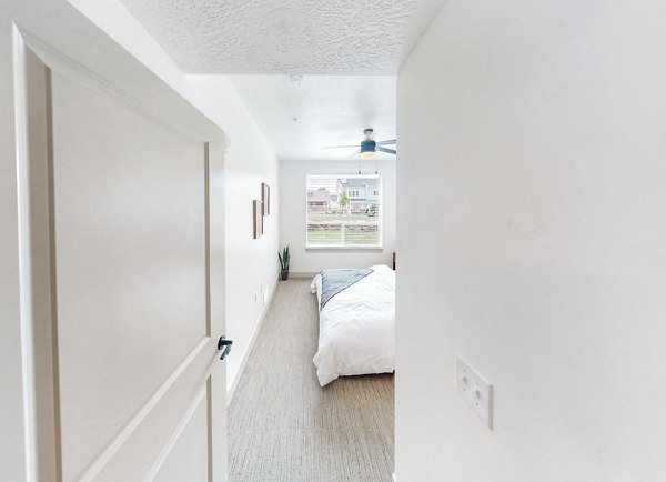 Spacious bedroom with modern decor at Sequoia Apartments in Turner Mill