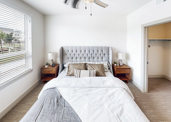 Cozy bedroom with modern furnishings at Sequoia Apartments, Turner Mill