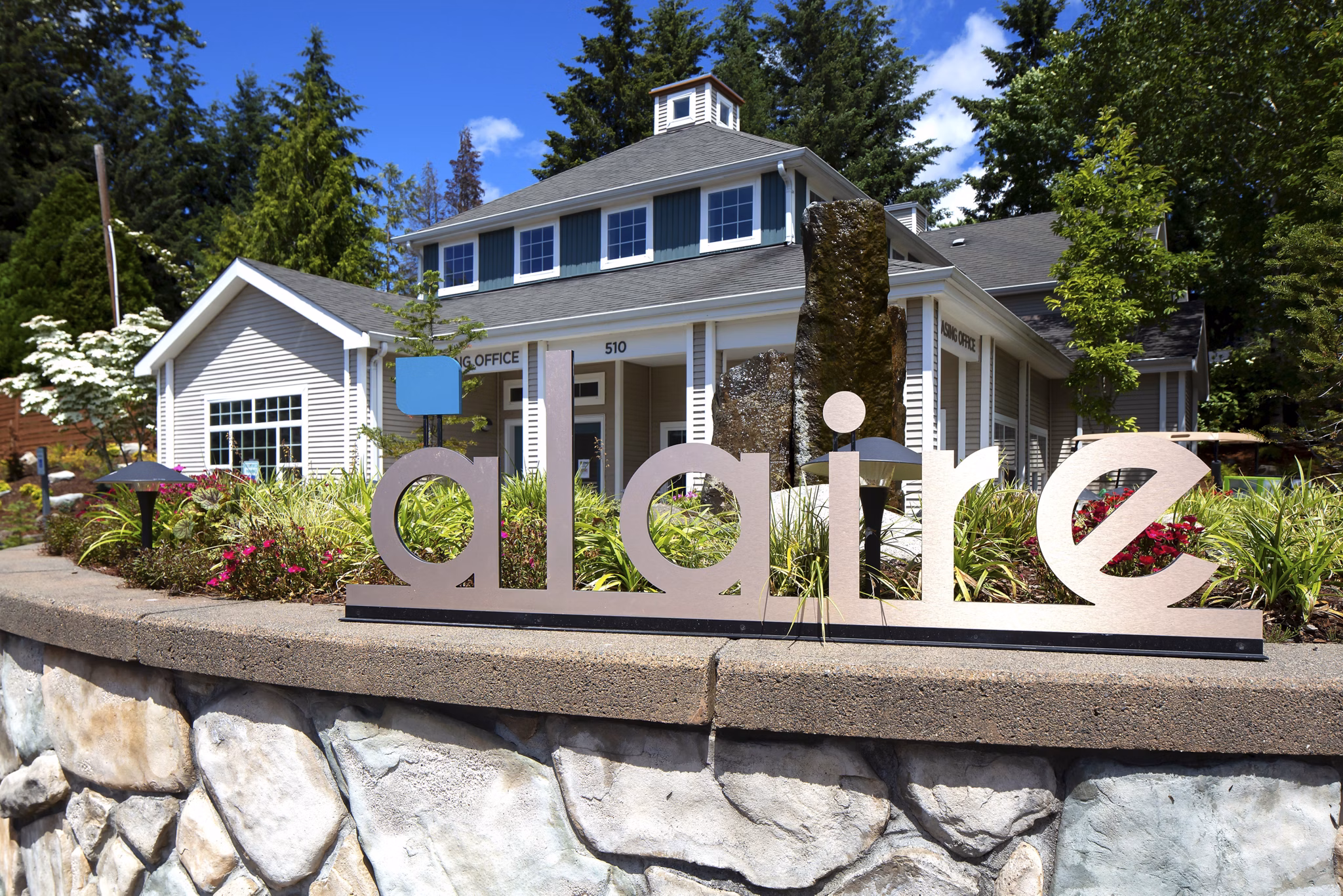 Alaire Apartment Homes: signage at luxury apartments in vibrant community