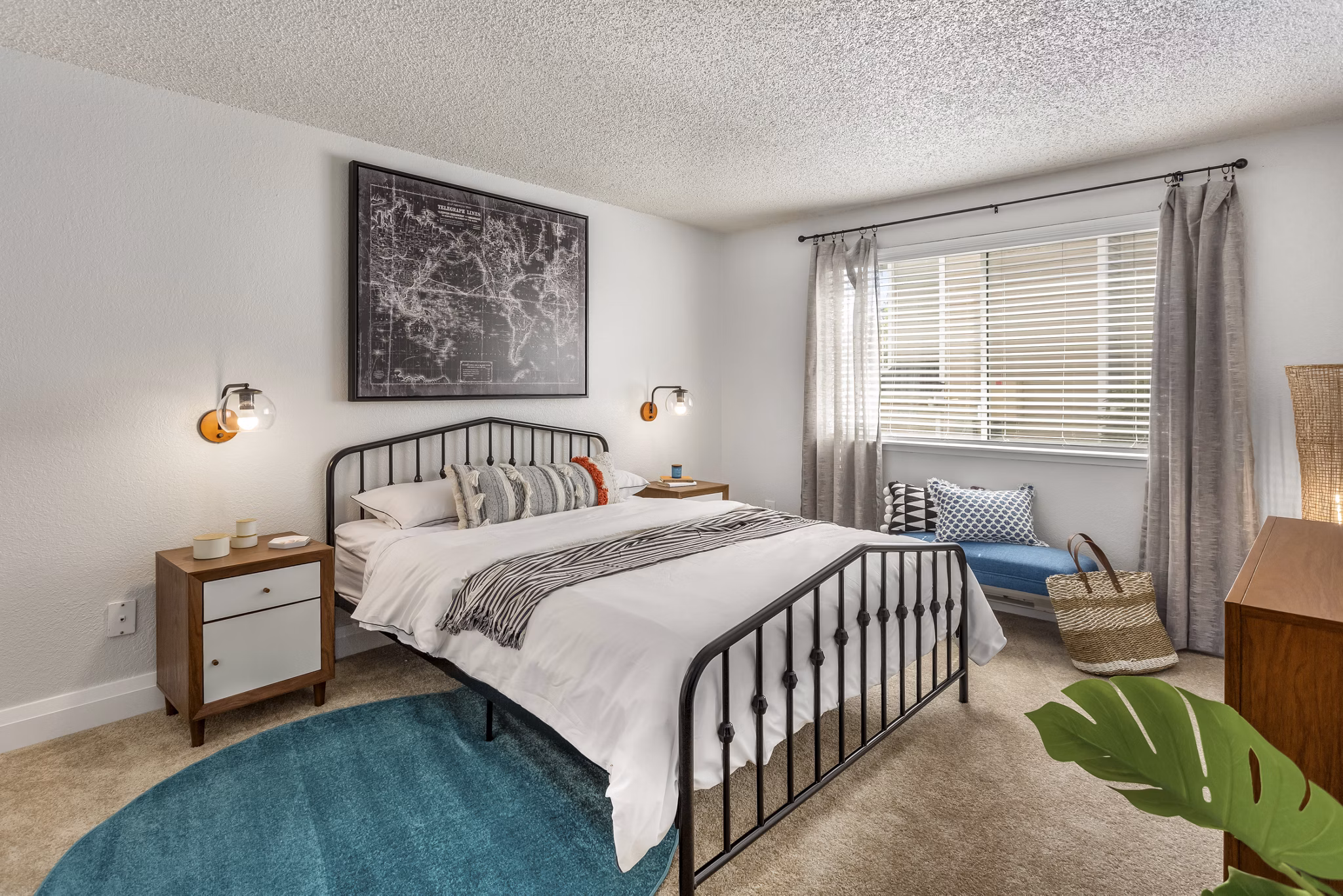 Cozy bedroom with modern furnishings at Alaire Apartment Homes Apartments