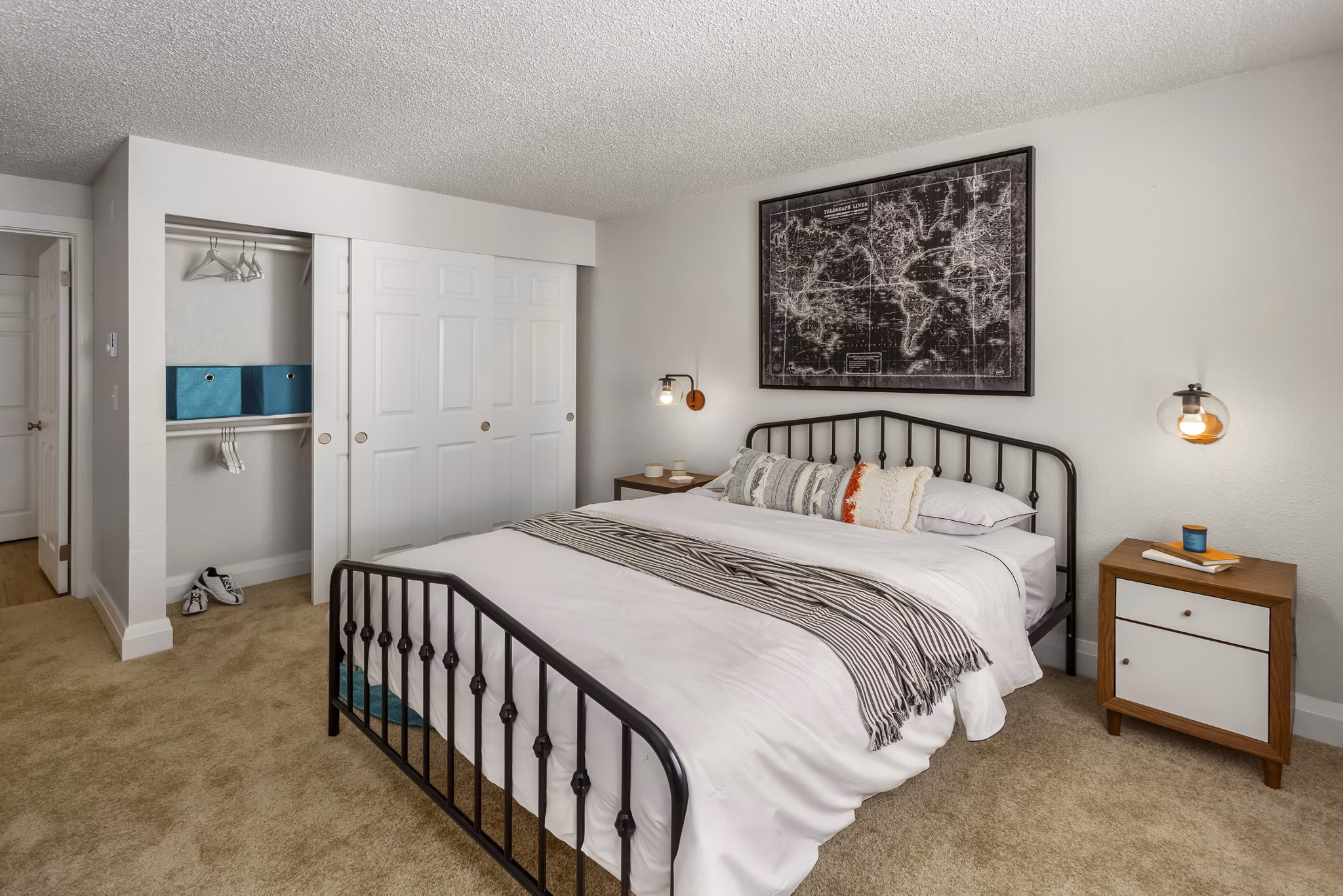 Cozy bedroom with modern decor at Alaire Apartment Homes, offering luxury living