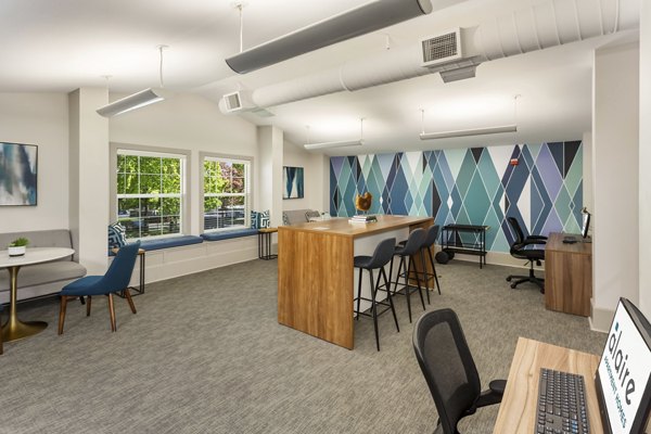 Bright home office with built-in shelving at Alaire Apartment Homes Apartments