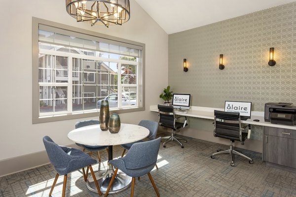 Home office with modern desk and natural light at Alaire Apartment Homes