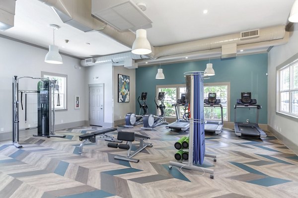 Modern fitness center with state-of-the-art equipment at Alaire Apartment Homes