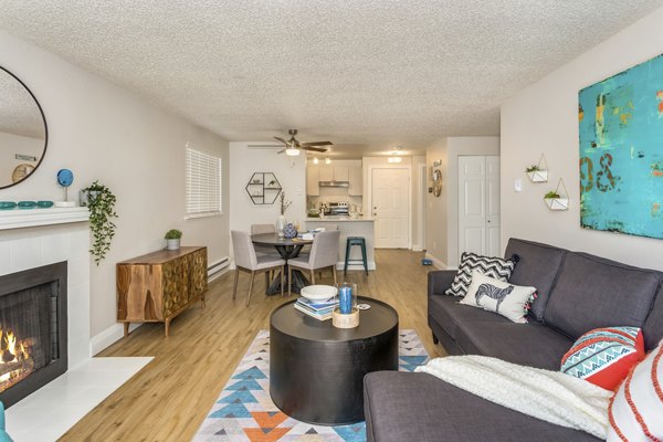 Spacious living room with modern decor at Alaire Apartment Homes apartments