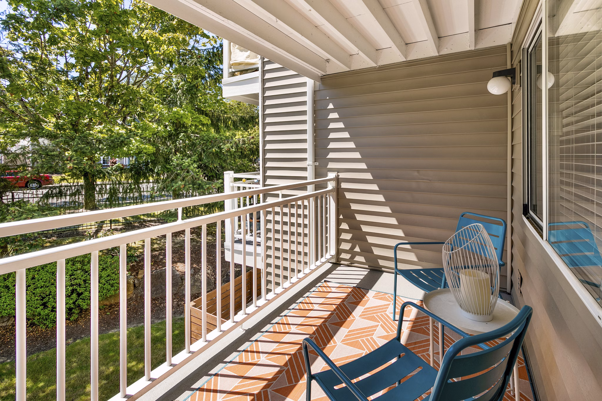 Private balcony with city views at Alaire Apartment Homes