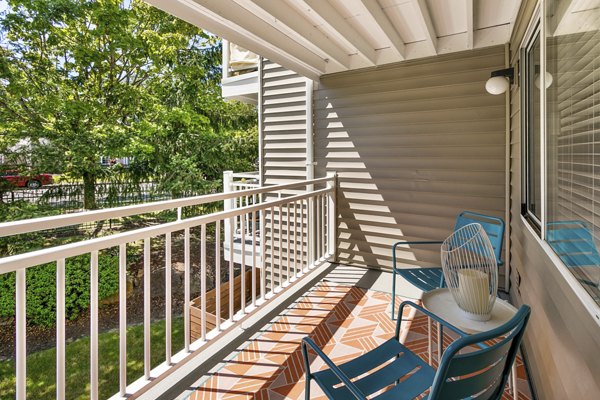 Private balcony with city views at Alaire Apartment Homes