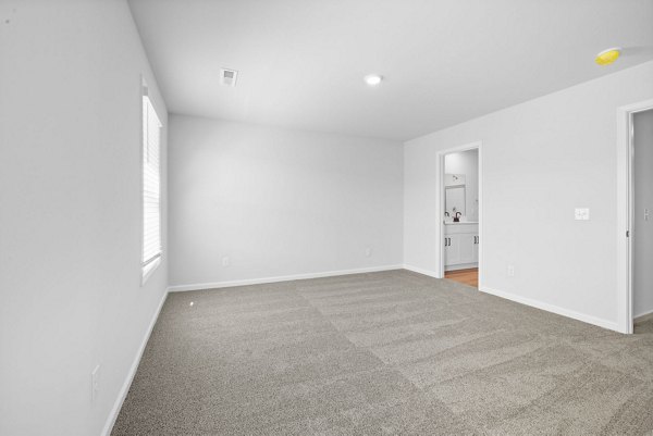 bedroom at Spire at Darrowby Ridge Apartments